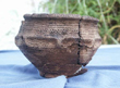 click to enlarge image of Food vessel from previous excavation of Shaw Cairn
